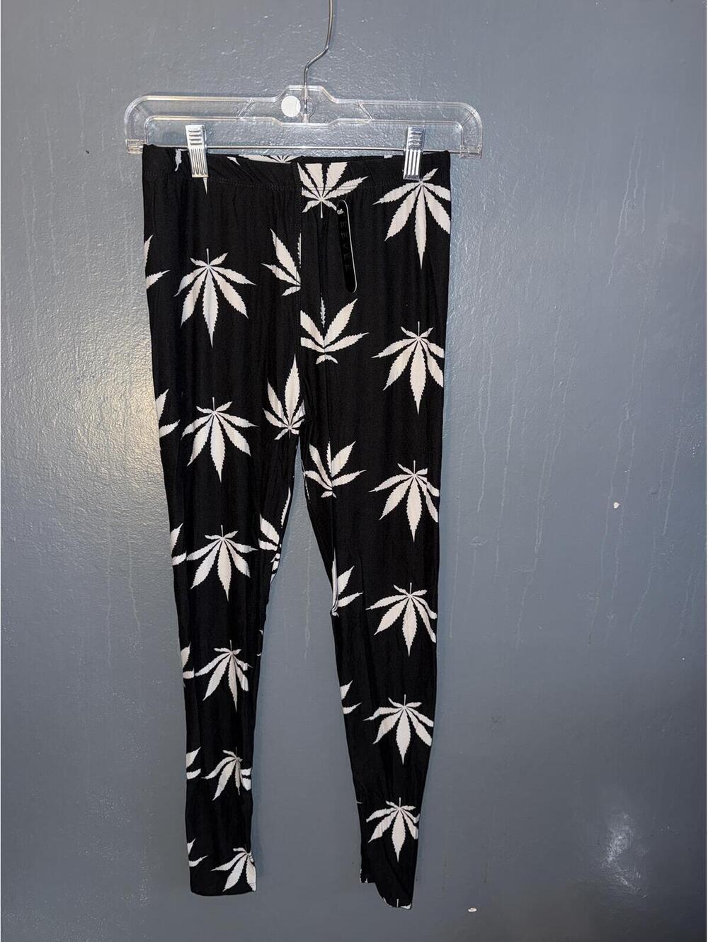 EEVEE Black Leggings with White Leaf Pattern